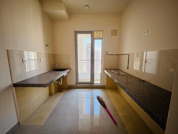 Kitchen in 2 BHK Apartment at Piramal Vaikunth, Balkum Pada – for Rent