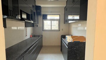 Kitchen in 2 BHK Apartment at Ashar Axis, Majiwada – for Rent