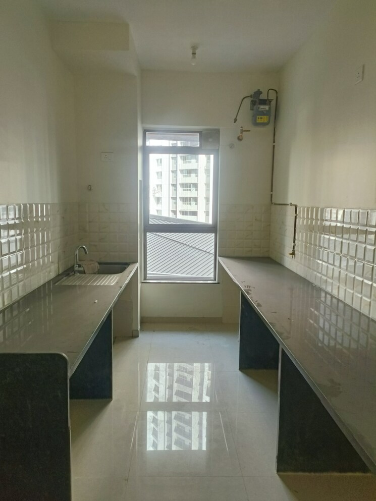 Kitchen, kalpataru-immensa 2 Bedroom 771 Sq.Ft. Apartment In Kolshet Road Thane 8239070