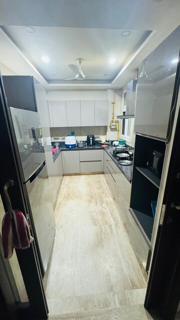 Kitchen in 3 BHK Builder Floor at Green Park – for Sale