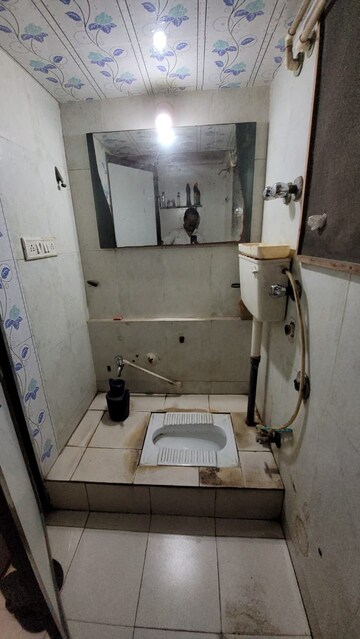 Bathroom in 2 BHK Apartment at Evershine Pine CHS, Mira Road – for Sale