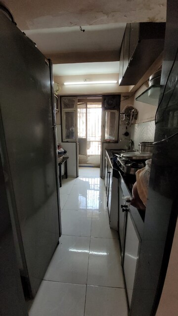 Kitchen in 2 BHK Apartment at Evershine Pine CHS, Mira Road – for Sale