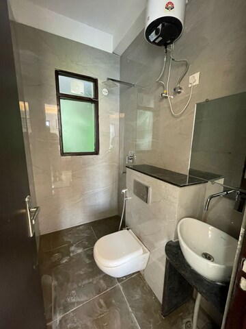 Bathroom in 2 BHK Builder Floor at Ansal Sushant Apartments, Sushant Lok I – for Rent