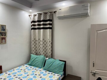 Bedroom in 2 BHK Builder Floor at Mahavir Enclave 1 – for Rent
