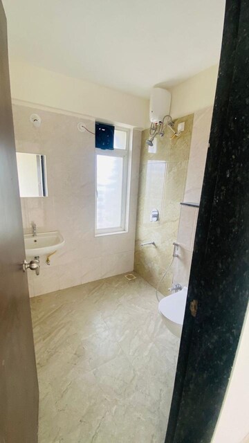 Bathroom in 3 BHK Apartment at Mantra Insignia, Mundhwa – for Rent