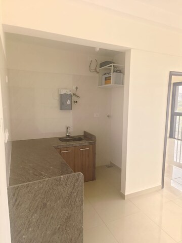 Kitchen in 1 RK Apartment at Duville Riverdale Suites, Kharadi – for Rent