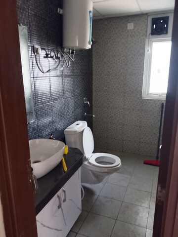 Bathroom in 3.5 BHK Apartment at Omaxe Grand, Sector 93b – for Rent