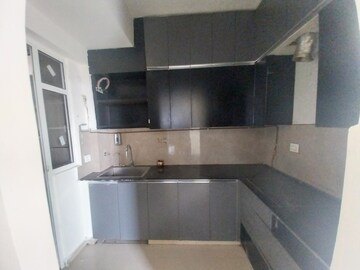 Kitchen in 2 BHK Apartment at Mahagun Mywoods, Sector 16c Greater Noida – for Rent