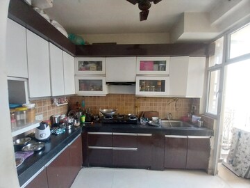 Kitchen in 2.5 BHK Apartment at Mahagun Mywoods, Sector 16c Greater Noida – for Rent