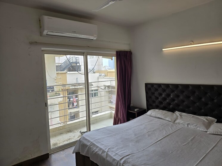 Bedroom, jaypee-greens-kosmos 2 Bedroom 1200 Sq.Ft. Apartment In Sector 134 Noida 8239399