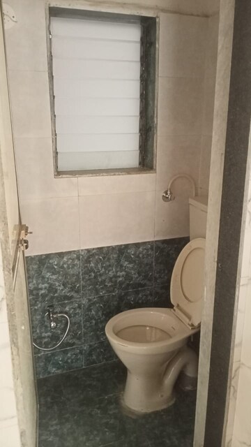 Bathroom in 1 BHK Apartment at Frenny Platinum Tower, Vasai East – for Sale