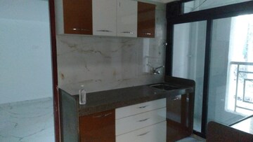 Kitchen in 1 BHK Apartment at Shellproof Gladiolus Tower, Vasai East – for Sale