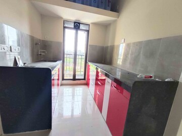 Kitchen in 1 BHK Apartment at Rustomjee Global City – for Sale