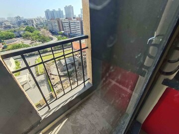 Balcony in 1 BHK Apartment at Rustomjee Global City – for Sale