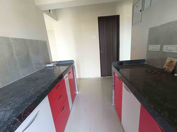 Kitchen in 1 BHK Apartment at Rustomjee Global City – for Sale