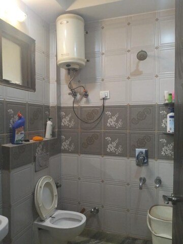 Bathroom in 3 BHK Apartment at Rohini Sector 13 – for Sale