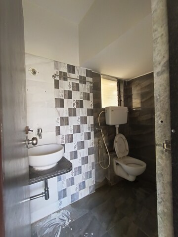 Bathroom in 1 BHK Apartment at Rustomjee Global City – for Sale