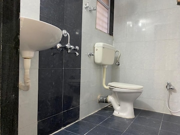 Bathroom in 2 BHK Apartment at Rustomjee Global City – for Sale