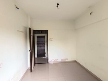 Master Bedroom in 2 BHK Apartment at Rustomjee Global City – for Sale