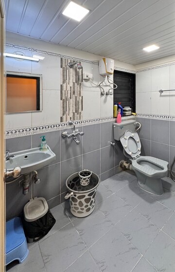 Bathroom in 1 BHK Apartment at Dheeraj Hill View Tower, Borivali East – for Sale