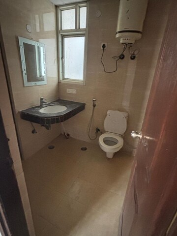 Bathroom in 3 BHK Apartment at Mahagun Mywoods, Sector 16c Greater Noida – for Sale