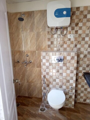 Bathroom in 3.5 BHK Apartment at Ansals Celebrity Greens, Sushant Golf City – for Rent