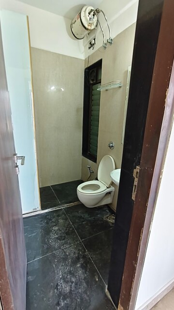 Bathroom in 3 BHK Apartment at Satellite Tower, Goregaon East – for Rent