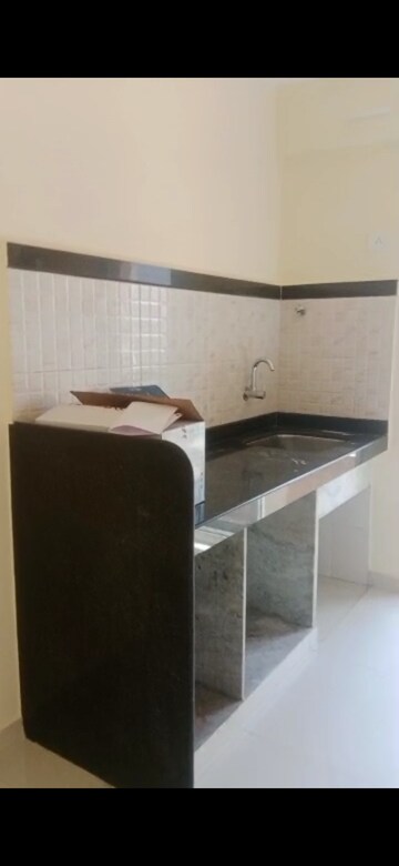 Kitchen in 1 BHK Apartment at Mahavir Kalpavruksha, Ghodbunder Road – for Rent