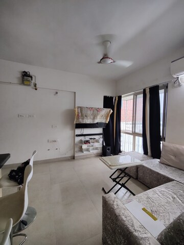 Living Room in 1 BHK Apartment at Aspen Park, Goregaon East – for Rent