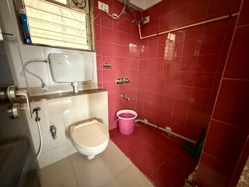 Bathroom in 2 BHK Apartment at Kanakia Spaces Niharika, Manpada – for Sale
