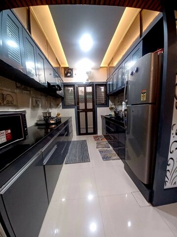 Kitchen in 2 BHK Apartment at Shivkala CHS, Vasai East – for Sale