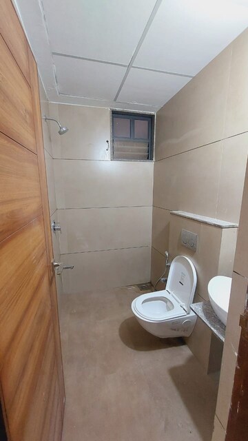 Bathroom in 3 BHK Apartment at Chanakyapuri – for Rent