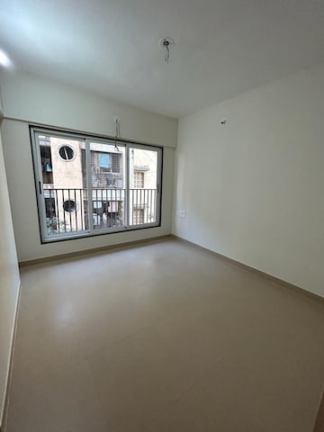 Room in 2 BHK Apartment at JP Eminence, Andheri West – for Rent