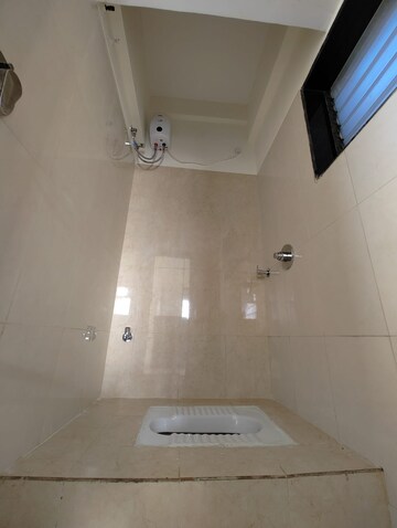 Bathroom in 2 BHK Apartment at Pranjee Garden City, Katrap – for Sale