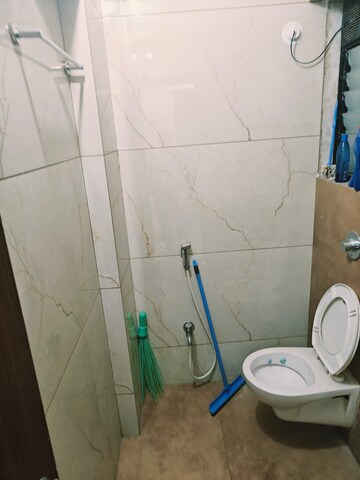 Bathroom in 1 BHK Apartment at Brahmand CHS, Brahmand – for Sale