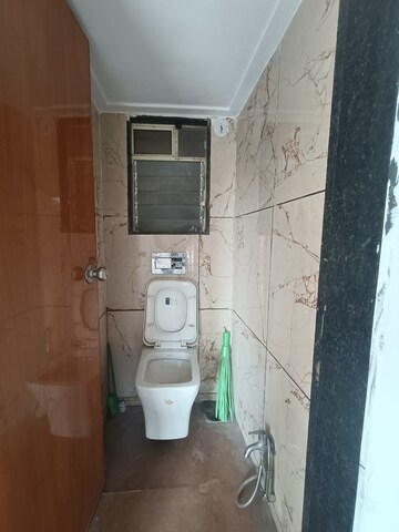 Bathroom in 1 BHK Apartment at RNA NG VIBRANCY, Mira Road – for Rent