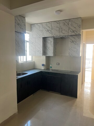 Kitchen in 3 BHK Apartment at ROF Aalayas, Sector 102 – for Rent
