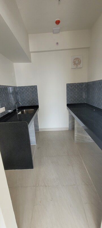 Kitchen in 2 BHK Apartment at Lodha Crown Quality Homes, Majiwada – for Rent