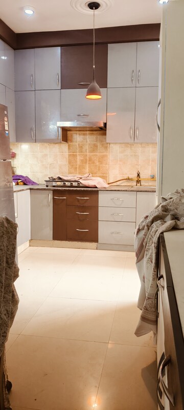 Kitchen in 3 BHK Apartment at Amrapali Golf Homes, Sector 4, Greater Noida – for Sale