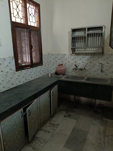 Kitchen in 2 BHK Apartment at Dhakoli Village – for Rent