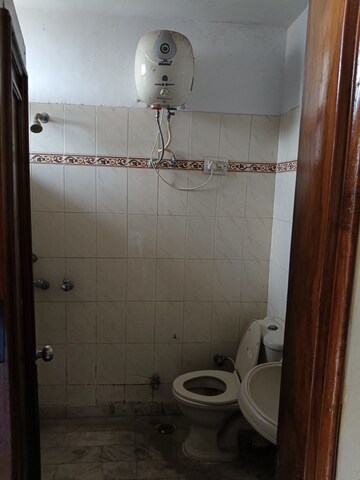 Bathroom in 2 BHK Apartment at Dhakoli Village – for Rent