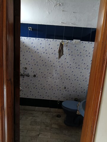 Bathroom in 2 BHK Apartment at Dhakoli Village – for Rent