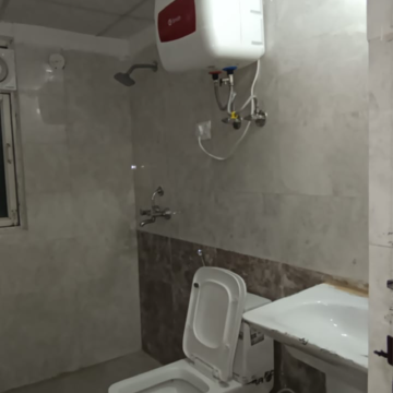 Bathroom in 2 BHK Apartment at Aims Golf Avenue I, Sector 75 – for Rent