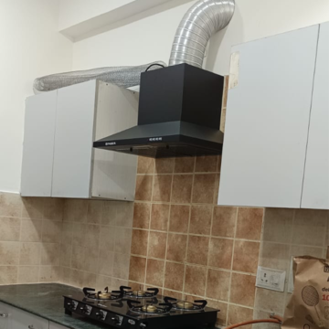 Kitchen in 2 BHK Apartment at Aims Golf Avenue I, Sector 75 – for Rent
