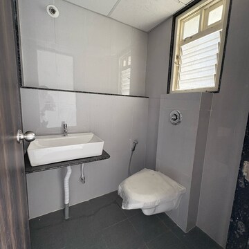 Bathroom in 2 BHK Apartment at Goel Ganga Altus, Santipur – for Rent