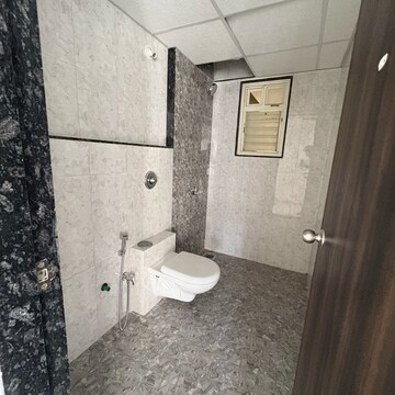 Bathroom in 2 BHK Apartment at Goel Ganga Altus, Santipur – for Rent