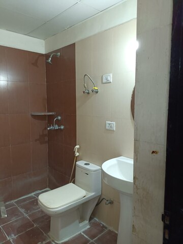 Bathroom in 2 BHK Apartment at Aims Golf Avenue I, Sector 75 – for Rent