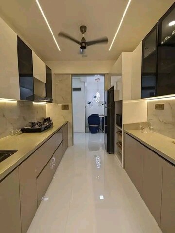Kitchen in 2 BHK Apartment at Dosti West County, Balkum Pada – for Sale