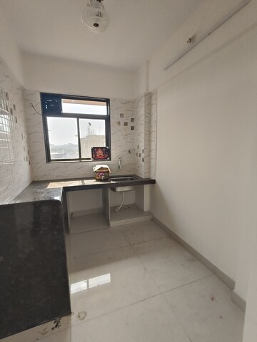Kitchen in 2 BHK Apartment at Murbad Road – for Sale