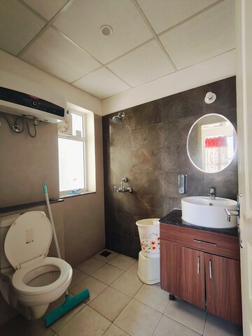 Bathroom in 3 BHK Apartment at International Airport Road – for Rent